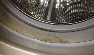 滚筒洗衣机怎么清理里面的脏东西（美的滚筒洗衣机怎么清理里面的脏东西）